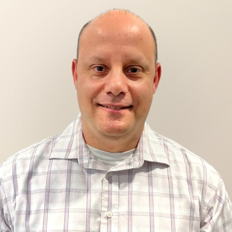 Headshot of Kevin Greene, MBA, MACP