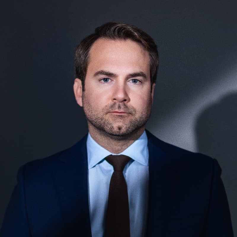 Headshot of Chris Walsh (J.D.)
