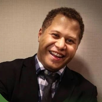 Headshot of Joshuah Marshall