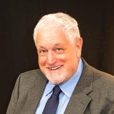 Headshot of Dr. Laurence J Stybel